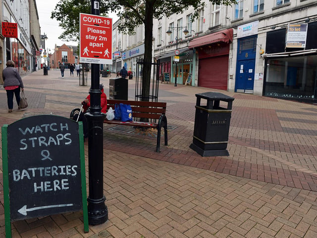 Mansfield Town centre 10 weeks into lockdown. Signs going up in preparation for more lockdown easing on Monday June 15th.