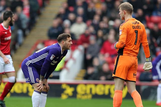 Billy Sharp of Sheffield United looks at Adam Davies of Barnsley following his save at Oakwell: Simon Bellis/Sportimage