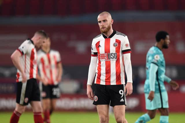 Sheffield United's Oli McBurnie reacts after the final whistle after defeat to Liverpool: Oli Scarff/PA Wire.