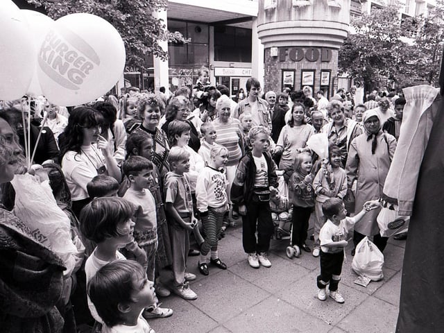 Crowds enjoying entertainment at the Castle and Sheaf Markets, Sheffield, September 1, 1990