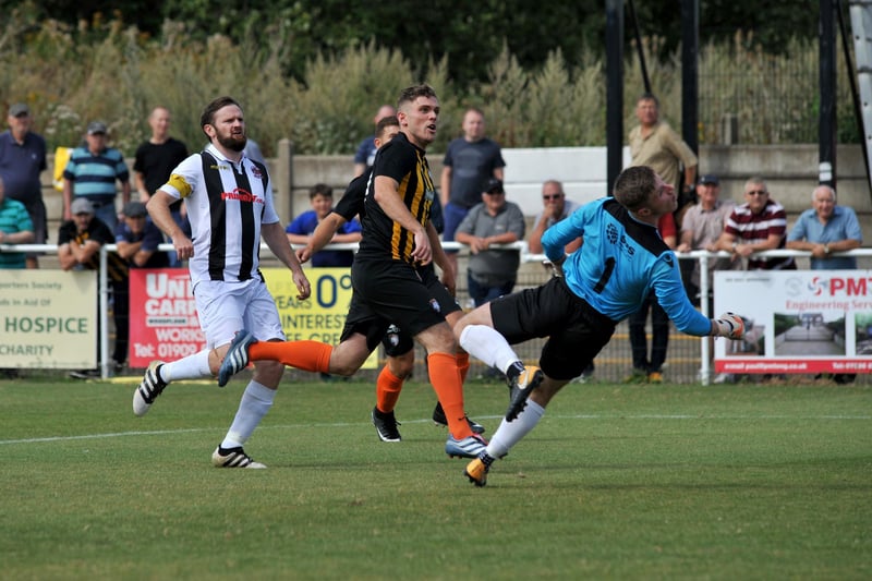Kyle Jordan beats his man and the keeper in a match against Shepshed Dynamo.