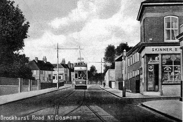 A tram on the single track in Brockhurst Road.
In the early years this road boasted a range of small shops with large Victorian houses in-between. Trams used this route  between Gosport and Fareham until 1930.