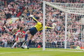David Seaman of Arsenal makes a spectacular save to keep Paul Peschisolido's header out in the FA Cup semi-final against Sheffield United at Old Trafford (Photo by Laurence Griffiths/Getty Images)