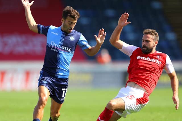 Scott Kashket of Wycombe Wanderers is challenged by Clark Robertson of Rotherham United (Photo by Warren Little/Getty Images)