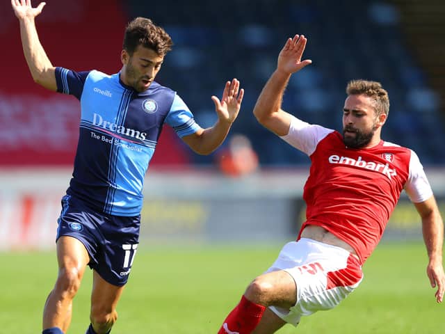 Scott Kashket of Wycombe Wanderers is challenged by Clark Robertson of Rotherham United (Photo by Warren Little/Getty Images)