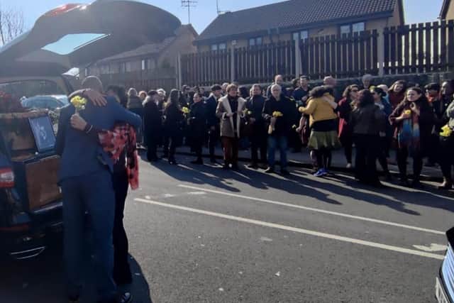 Hundreds lined the street, holding daffodils, this morning as the Isilda Lang’s funeral cortege took her on her last journey from her home on Scott Road, Burngreave, to her funeral at Grenoside Crematorium.