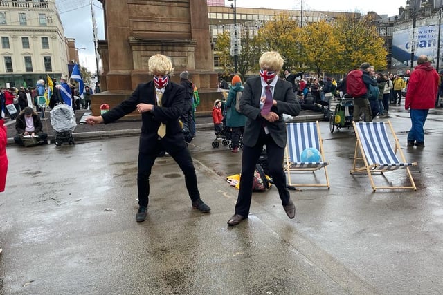 The activists dressed up as Boris Johnson doing some more dancing in George square.