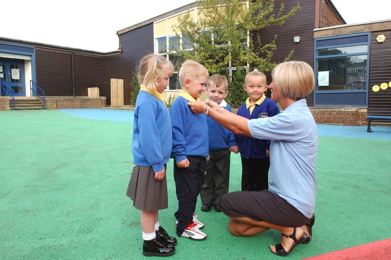 Head teacher Elizabeth Harwood gets to know her new pupils in this lovely 2004 photo at Parkside Infants School in Seaham. But who are the children enjoying their time in the playground?