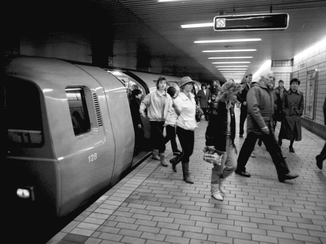 Passengers leaving the subway train at St Enboch underground station in Glasgow, December 1986.