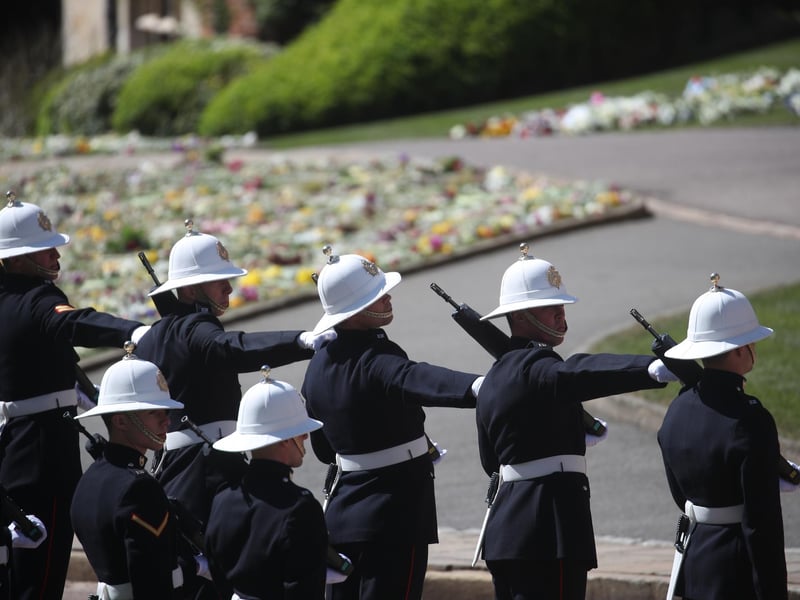 Members of the Royal Marines line the route of the procession at Windsor Castle.