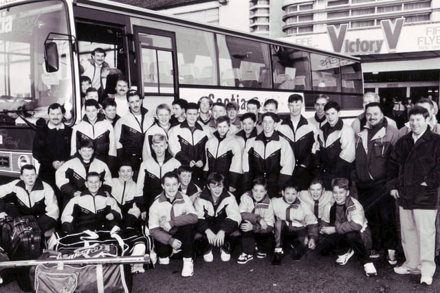 Fife Flyers junior ice hockey players en route to Brno in Czechoslovakia. The group includes Chic Cottrell, junior development director (left, next to bus) and among the players are Steven King, Steven Lynch and Richard Dingwall.