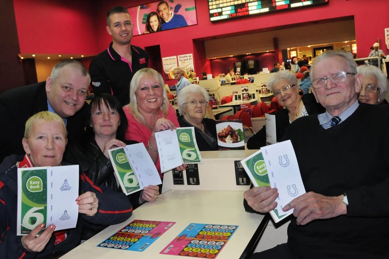 Manager Billy Thompson  (back, left) with staff and regulars at the Mecca Bingo in Holmeside, Sunderland taking part in a special Friday the 13th session in 2012.
