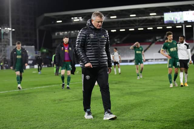 Chris Wilder walks off following Sheffield United's defeat by Fulham at Craven Cottage: David Klein/Sportimage