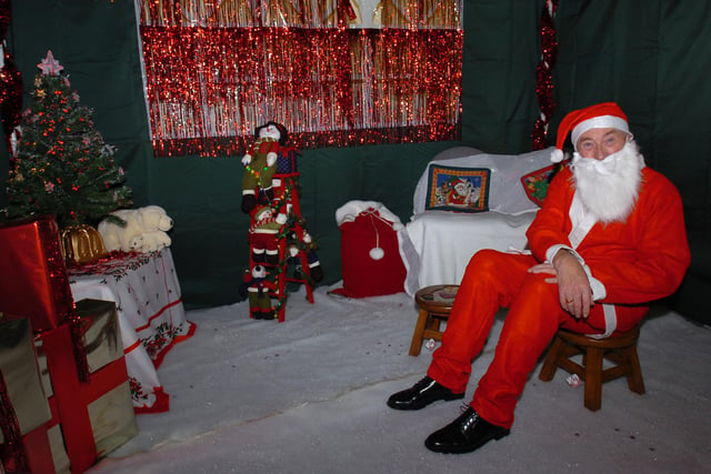 Santa waits to meet his adoring fans at the Place in the Park in 2008.