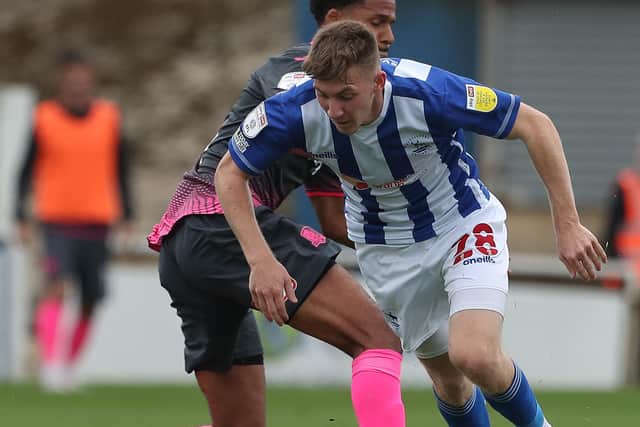 Matty Daly of Hartlepool United in action with Exeter City's Sam Nombe during the Sky Bet League 2 match between Hartlepool United and Exeter City at Victoria Park, Hartlepool on Saturday 25th September 2021. (Credit: Mark Fletcher | MI News)