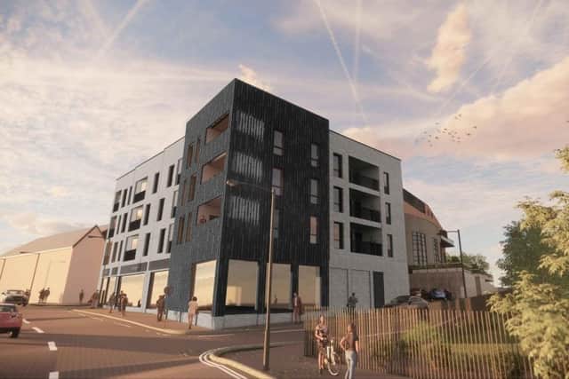 Developers are planning to transform a former pub and offices into ‘striking’ new blocks totalling 59 apartments on London Road.