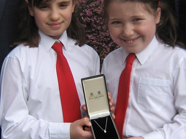 Kate Frampton and Pippa Crossland show the diamond pendant donated to Ashdell School by H.L. Brown, Jewellers, Sheffield, on April 15, 2009