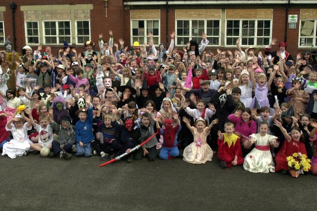 Staff and children at Southey Junior School in fancy dress as characters from books to celebrate World Book Day in 2001