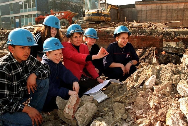 Students who will do their GCSE's in the new buildings at the Waltheof School.  Left to right: Ali Ditta, Daniel Hayes, Kelly Badger, deputy head Maggie Payne, Kim Horton and Shona Brown, view the rebuilding work at the school, March 1997