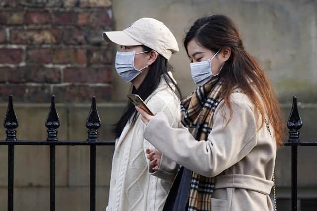 A number of people are wearing masks to try to avoid contracting coronavirus (PiC: Ian Forsyth/Getty Images)