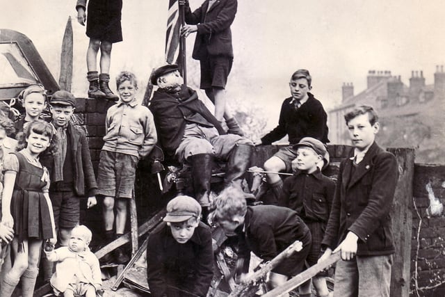 Youngsters of Rushdale Avenue, Meersbrook make ready for the burning of Hitler's effigy in May 1945