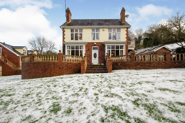 The property is described as an "impressive detached residence".