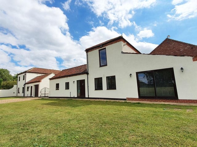This two bedroomed stable conversion has a well appointed shaker style kitchen which opens up to a large living area.