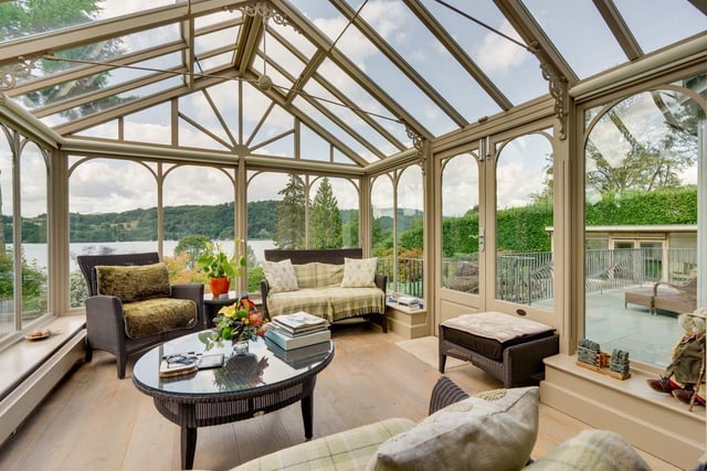 The conservatory is accessed through the open plan dining area and offers fabulous views of the garden and lake.
