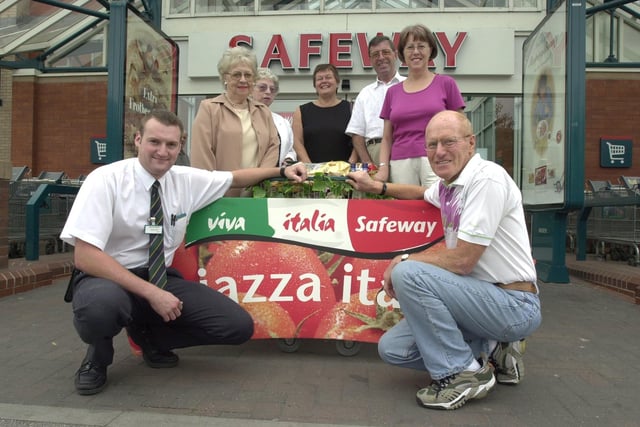 Italian week competiton winners at Safeway, Ecclesall Road. Main prizewinner Ron Jepson right front with store Manager Dave Riby left front and other winners L to R rear Doreen Andrew, Barbara Kirk, Val Hicklin and Tony and Yvonne Lazenby, July 6 2001.