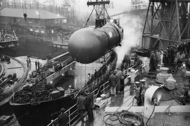 One of the two 50-ton pressure cargo tanks being fitted into the 535-ton motor vessel Broughty as part of its conversion into a liquid gas carrier at Hawthorn Leslie. This photo was taken in November 1963.