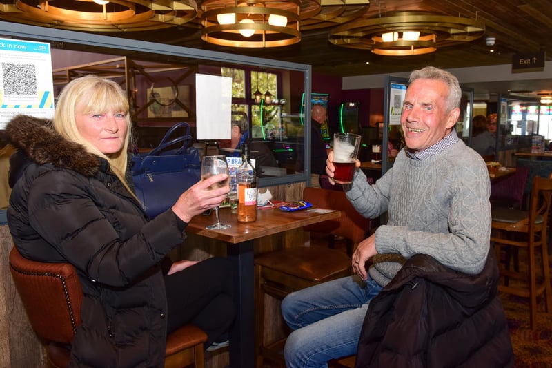 Billy and Deborah Carruthers enjoy a drink in a pub.