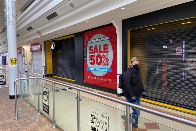 Sale signs now adorn abruptly-closed stores.