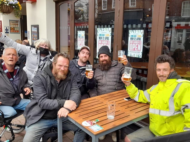 For Pete Webb, left, there's more to the pubs reopening than just getting a pilsner. He said: 'It really is wonderful to be back at the pub, instead of sat at home alone. It's the friendship I've missed, spending time with people.' Picture: David George