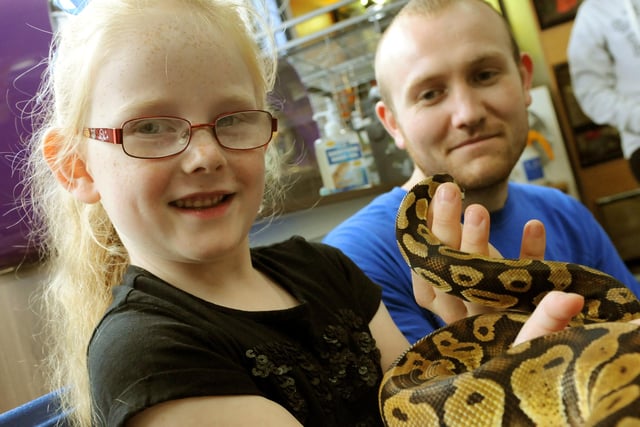 An open day at The Reptile Hotel in 2014 and Franky Nicholas was pictured holding a Royal Python, with The Reptile Hotel's Andrew Nickerson in the background.