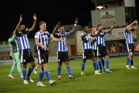 Sheffield Wednesday players celebrate their 3-0 win at Morecambe.