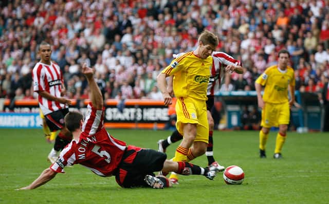 Sheffield Utd vs Liverpool - Steven Gerrard goes down under Chris Morgan's challenge for a penalty