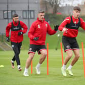 Ciaran Clark (centre) trains with Sheffield United ahead of their game against Coventry City: Lexy Ilsley/Sportimage