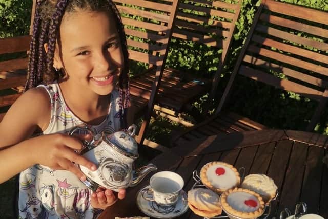 A Hartley Brook pupil holds a VE Day tea party at home during lockdown.