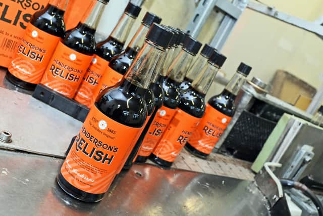 Bottles of Henderson's Relish on the production line. Picture: Marie Caley.