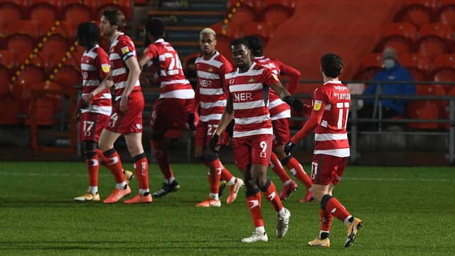 Rovers celebrate after Fejiri Okenabirhie gives them the lead against AFC Wimbledon. Picture: Andrew Roe/AHPIX