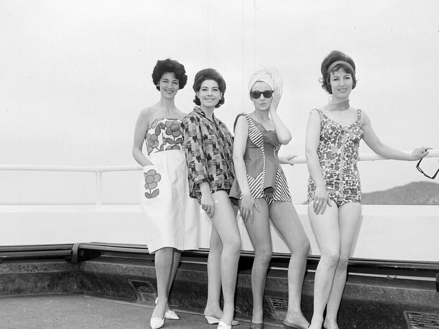 Summer 1963 was a hot one in North Berwick. Four bathers are pitured taking advantage of the sunny weather at North Berwick swimming pool.