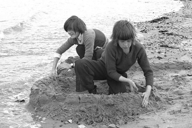 Back to July 1974 and these youngsters were building a sandcastle with the tide getting closer.