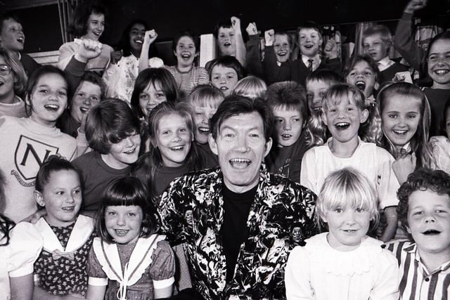 Youngsters in Dronfield record a song with singer Dave Berry.