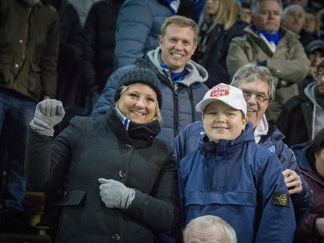 Fans keeping their spirits up at Fratton Park.
