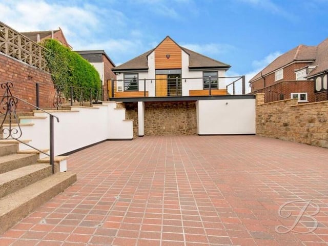 When you arrive outside to the front of the property, you will find that there is a spacious driveway allowing for ample off street parking.