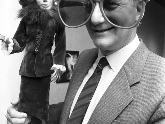 Gerry Anderson, puppeteer and producer of classic shows such as Thunderbirds, Supercar and Stingray, with a Lady Penelope puppet and 'Brains'-type glasses at the City Arts Centre in Edinburgh, March 1986