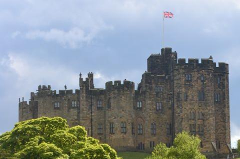 Alnwick Castle has been flying the NHS flag, but swapped it for the Union Flag for VE Day.