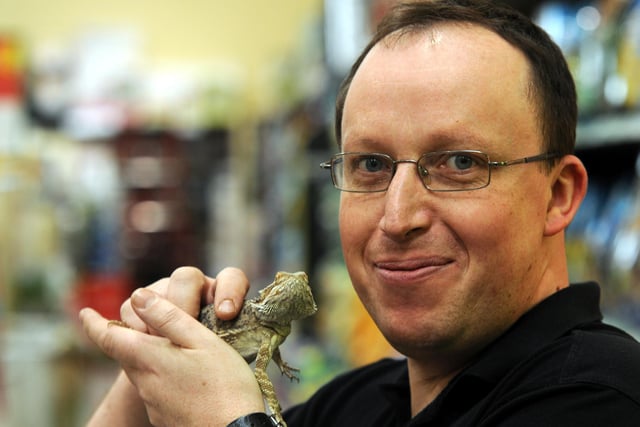 A scene from Pets At Home in 2010 with Peter Stonehouse and a bearded dragon in the picture.