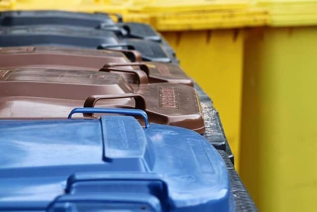 A row over bins between neighbours erupted into violence
