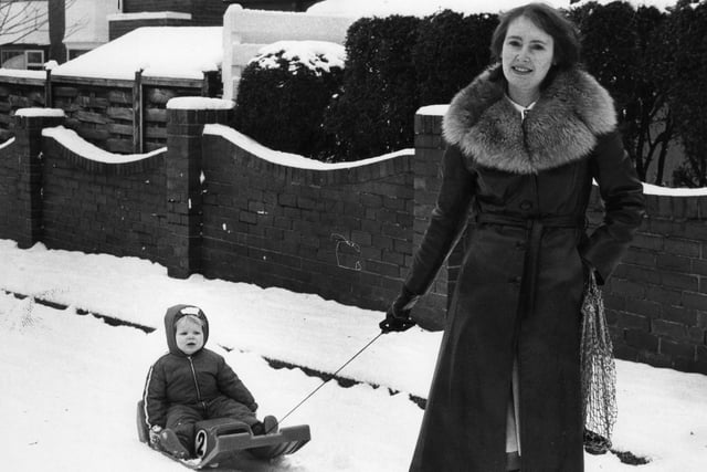 Margery Holmes walked to the shops using a sledge to transport 17-month old Neil in 1982.